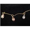 Image 2 : COLLECTION OF VINTAGE JOAN RIVERS EGG CHARMS