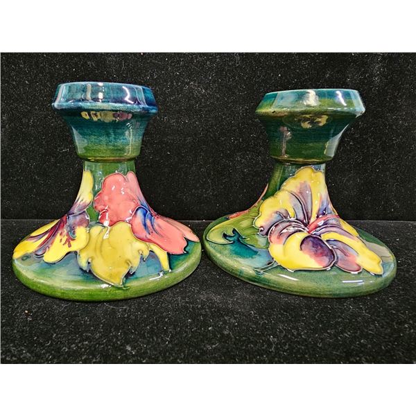 (2) VINTAGE MOORCROFT POTTERY HIBISCUS PATTERN CANDLE HOLDERS