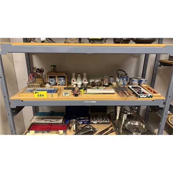 SHELF OF ASSORTED ASIAN ITEMS: CHOPSTICKS, PAPERWEIGHTS, SAKE JARS & CUPS, TEA SETS & MORE