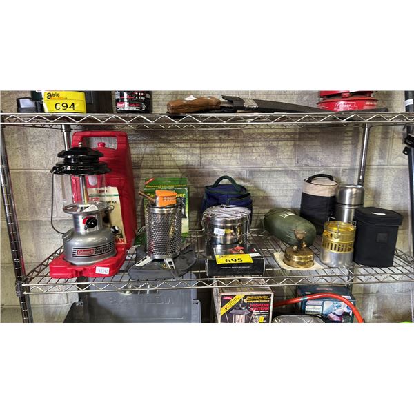 SHELF LOT OF ASSORTED CAMPING SUPPLIES INCLUDING COLEMAN LANTERN, CAMP SHOWER AND MORE