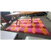 Image 1 : PATTERNED AREA RUG 8FT X 5.5FT (DAMAGED CORNER)