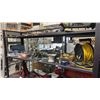 Image 1 : SHELF OF EXTENSION CABLE REEL, TOOL HANGER, ALLEN KEYS, WORK LIGHT, GARAGE DOOR SEAL & MORE