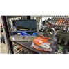 Image 4 : SHELF OF EXTENSION CABLE REEL, TOOL HANGER, ALLEN KEYS, WORK LIGHT, GARAGE DOOR SEAL & MORE