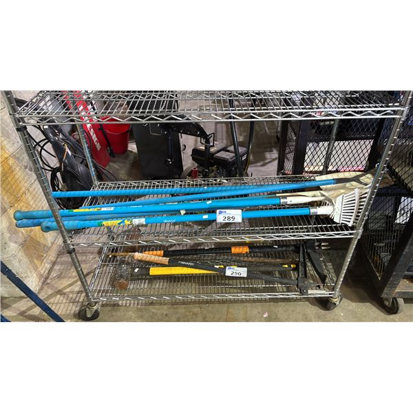SHELF OF ASSORTED RAKES & SHOVELS
