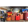 Image 2 : SHELF OF PLASTIC JERRY CANS & VINTAGE METAL GAS CANS