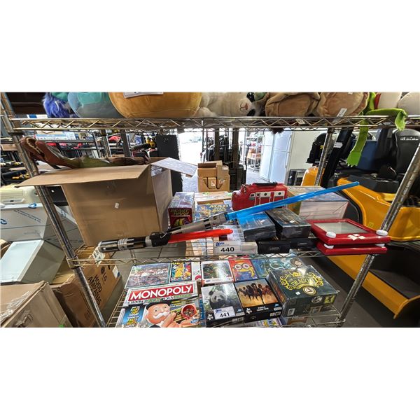 SHELF OF ASSORTED DINOSAUR TOYS, LIGHT SABERS, ETCH-A-SKETCH, LIGHTAILING LED KITS & MORE