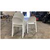 Image 3 : STACK OF 6 WHITE PLASTIC COMMERCIAL CURVED BACK OUTDOOR PATIO CAFE CHAIRS