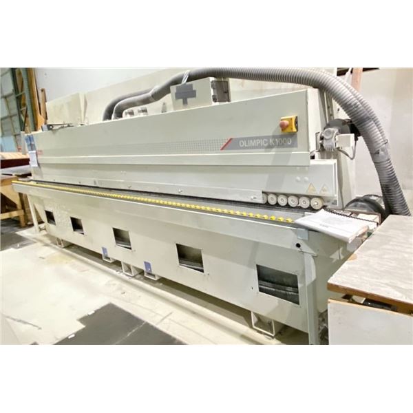 SCM OLIMPIC K1000 HEAVY-DUTY AUTOMATIC CNC EDGE BANDING MACHINE WITH 2 PALLETS OF REFEED CONVEYOR
