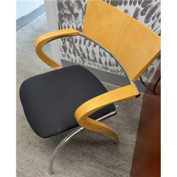 4 Modern Stacking Chairs with Black Seats and Blonde Wood Backs