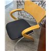 Image 1 : 4 Modern Stacking Chairs with Black Seats and Blonde Wood Backs
