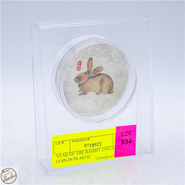 YEAR OF THE RABBIT COLOURED COIN IN PLASTIC