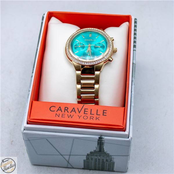 WOMANS CARAVELLE TEAL DIAL QUARTZ WATCH IN