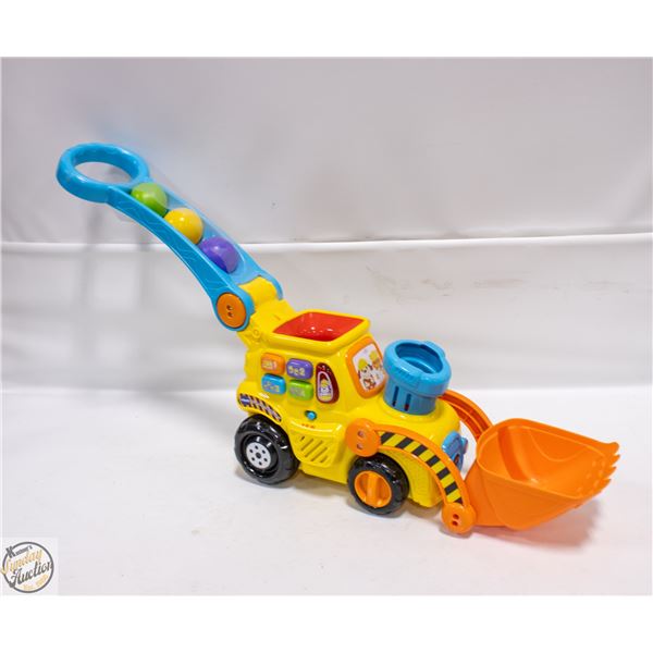 V TECH PUSH & POP BULLDOZER WITH BALLS