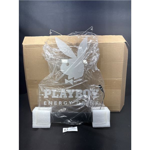 A New Light Up Playboy Energy Drink Counter Top Display