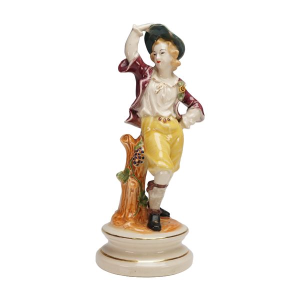 Hand-Painted Porcelain Country Boy Figurine