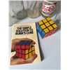 Image 5 : Pepsi Bottles, Rubik's Cube, Guide