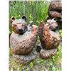 Image 1 : Two 19-Inch Bear Huggers Statues