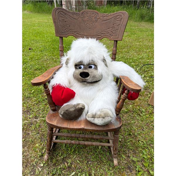Wooden Rocking Chair with Ornate Backrest Design
