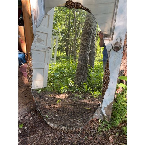 Ornate Wall Mirror With Decorative Frame