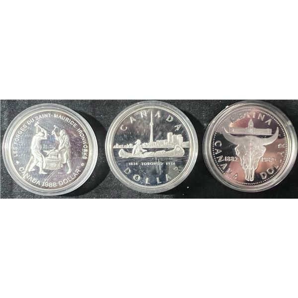 (3) 50% Silver Canadian Dollar Coins: 1982, 1984, 1988