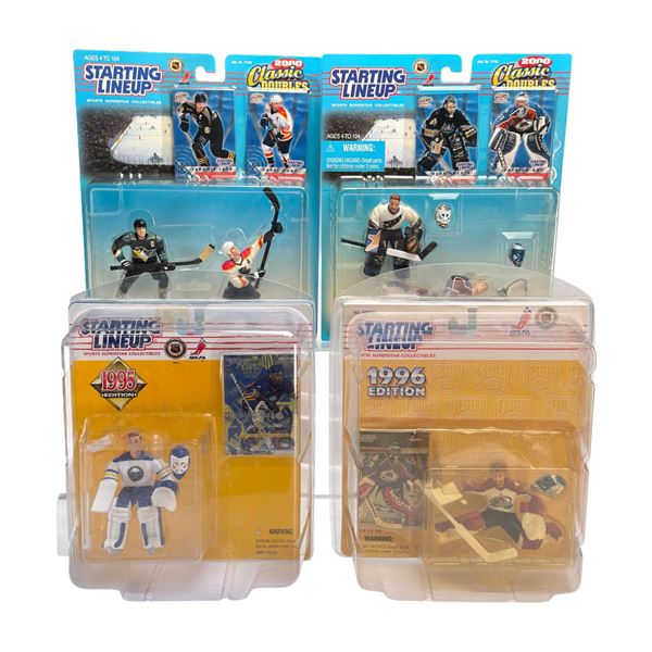 4pc Collection of NHL Starting Lineup Action Figures featuring Roy, Hasek, Jagr, and Bure