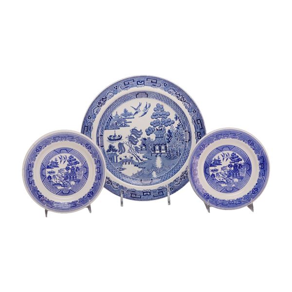 A Trio of Blue Willow Pattern Ceramic Plates by Wedgwood and Buffalo China
