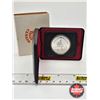 Image 1 : RCM Canada Silver Dollar 1875-1975 Calgary (Black Clamshell Case)