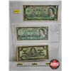 Image 1 : Canada $1 Bills (3) : - 1967 Beattie/Rasminsky #KP3614726 - 1954 Bouey/Rasminsky #TF1852932 - 1937 G