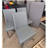 Image 2 : 4 Modern Grey Chairs and 2 Large Upholstered Cushions