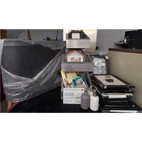 Household Items: Frames, Soap Dispensers, Books, Mat