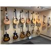 Image 3 : SAMPLE OF WHAT'S COMING — Acoustic guitars in an assortment of finishes and body styles.