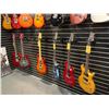 Image 2 : SAMPLE OF WHAT'S COMING — Premium electric guitars in a variety of styles and finishes.
