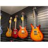 Image 3 : SAMPLE OF WHAT'S COMING — Premium electric guitars in a variety of styles and finishes.