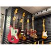 Image 5 : SAMPLE OF WHAT'S COMING — Premium electric guitars in a variety of styles and finishes.
