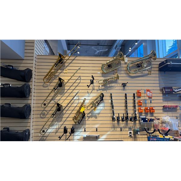 WHAT'S COMING — Brass and woodwind instruments, including trombones, trumpets and clarinets