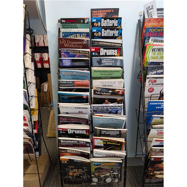 LOT OF +/- 50 DRUM BOOKS WITH MAGAZINE RACK