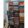 Image 1 : LOT OF +/- 50 DRUM BOOKS WITH MAGAZINE RACK
