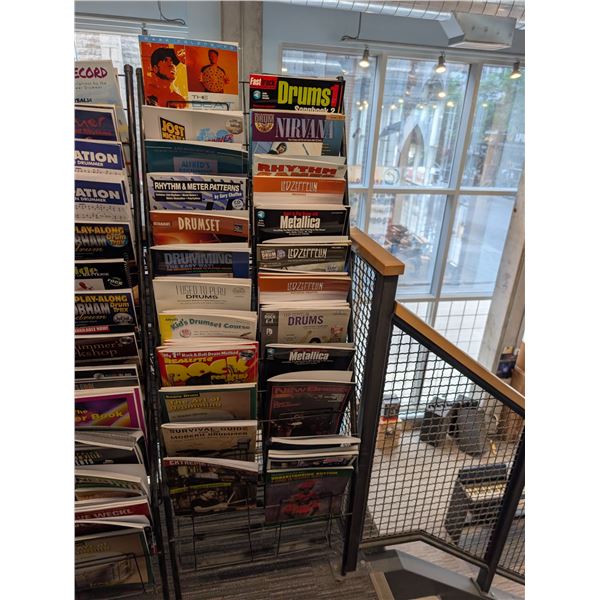 LOT OF +/- 50 DRUM BOOKS WITH MAGAZINE RACK
