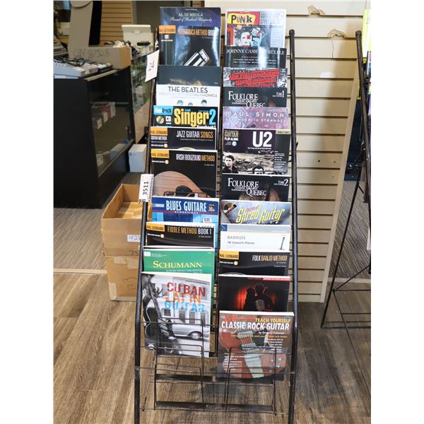 LOT OF 24 ASSORTED MUSIC BOOKS WITH DISPLAY RACK