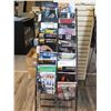 Image 1 : LOT OF 24 ASSORTED MUSIC BOOKS WITH DISPLAY RACK