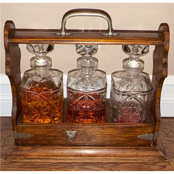 Wood And Brass Tantalus With Three Cut Glass Decanters