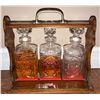 Image 3 : Wood And Brass Tantalus With Three Cut Glass Decanters