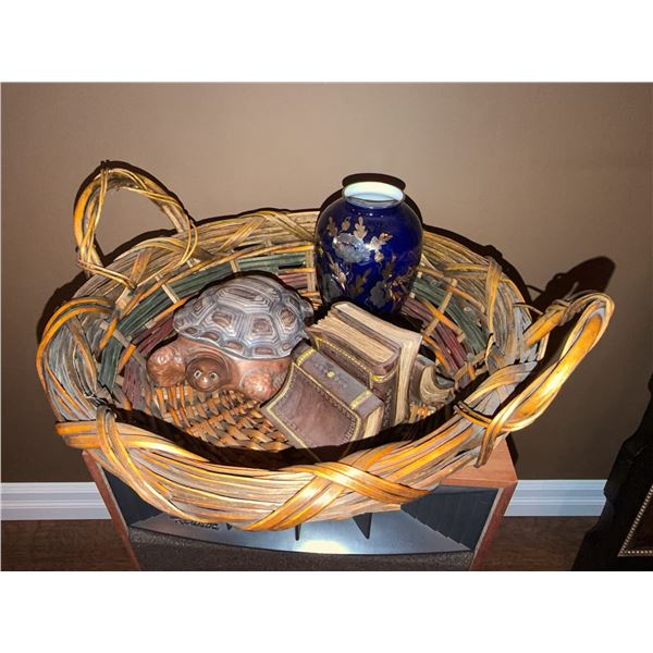Wicker Basket With Ceramic Turtle Box, Blue Vase, and Bookends