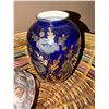 Image 2 : Wicker Basket With Ceramic Turtle Box, Blue Vase, and Bookends