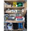 Image 1 : Contents of Shelf Including Tools, Fitness Weights, and Hardware