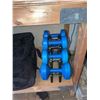Image 2 : Contents of Shelf Including Tools, Fitness Weights, and Hardware