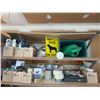 Image 5 : Contents of Shelf Including Tools, Fitness Weights, and Hardware