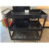 Image 2 : Metal Utility Cart, Four-Drawer File Cabinet, and Green Storage Locker