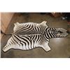 Image 2 : ZEBRA Hide Rug with Leather Piping