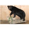 Image 1 : XXL Life-sized BLACK BEAR on a Decorative Rock Base with Wheels